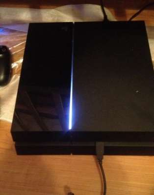 игровую приставку  Play Station 4