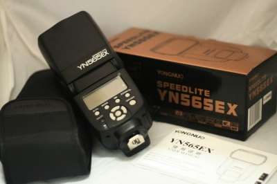 фотовспышку  YN565EX