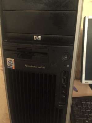 Процессор HP, плоский монитор, клавиатура