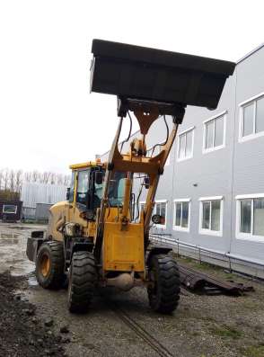 Услуги фронтального погрузчика 1.7 м3 в Новосибирске